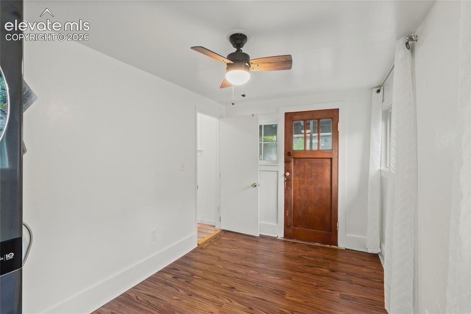 The laundry room walks out to the back yard and access to the crawl space