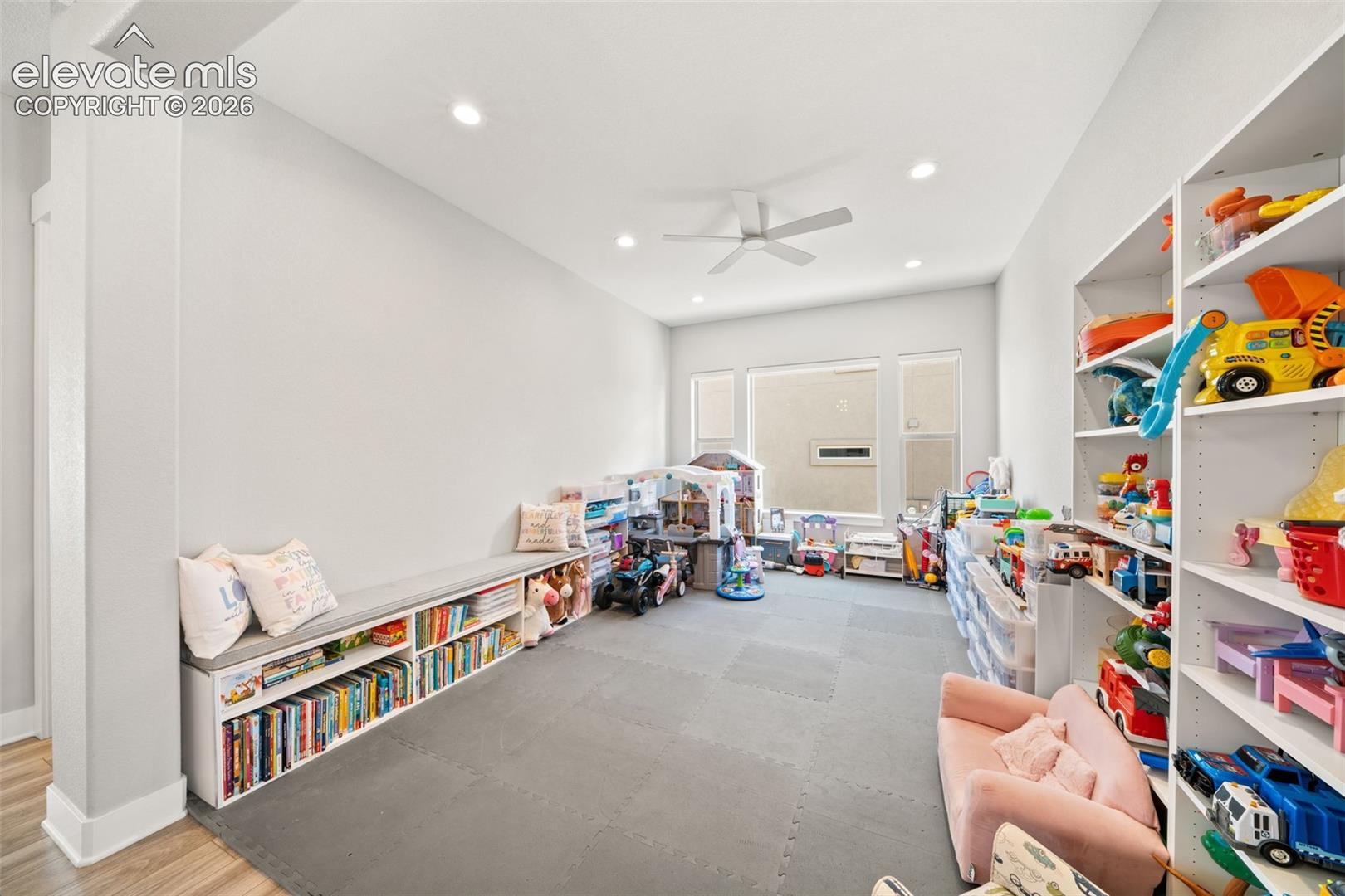 Formal dining room or sitting room.  Currently utilized as kids play room.