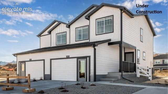 Below market rates are available with builder lender.The Boxelder is a two-story floor plan available at Ellston Park in Colorado Springs. This 1,476 sq. ft. home includes 3 bedrooms, 2.5 bathrooms, and a 2-car garage.  Step inside to discover a bright and open main level where the kitchen, dining, and living spaces flow together, creating the perfect backdrop for gatherings. The kitchen features premium cabinetry, modern appliances, and a large island that overlooks the spacious living room. A powder bath is tucked conveniently near the entry.  Upstairs, the large loft adds flexible living space—ideal for a second family room, home office, or gaming room. The primary bedroom retreat boasts a walk-in closet and an en-suite bathroom with dual sinks. Two additional bedrooms, a full bathroom, and a centrally located laundry room complete the second floor.  The Boxelder floor plan at Ellston Park combines style and practicality, giving you the space you need with the low-maintenance lifestyle you want. Schedule a visit today! ***Photos are representative and not of actual property***