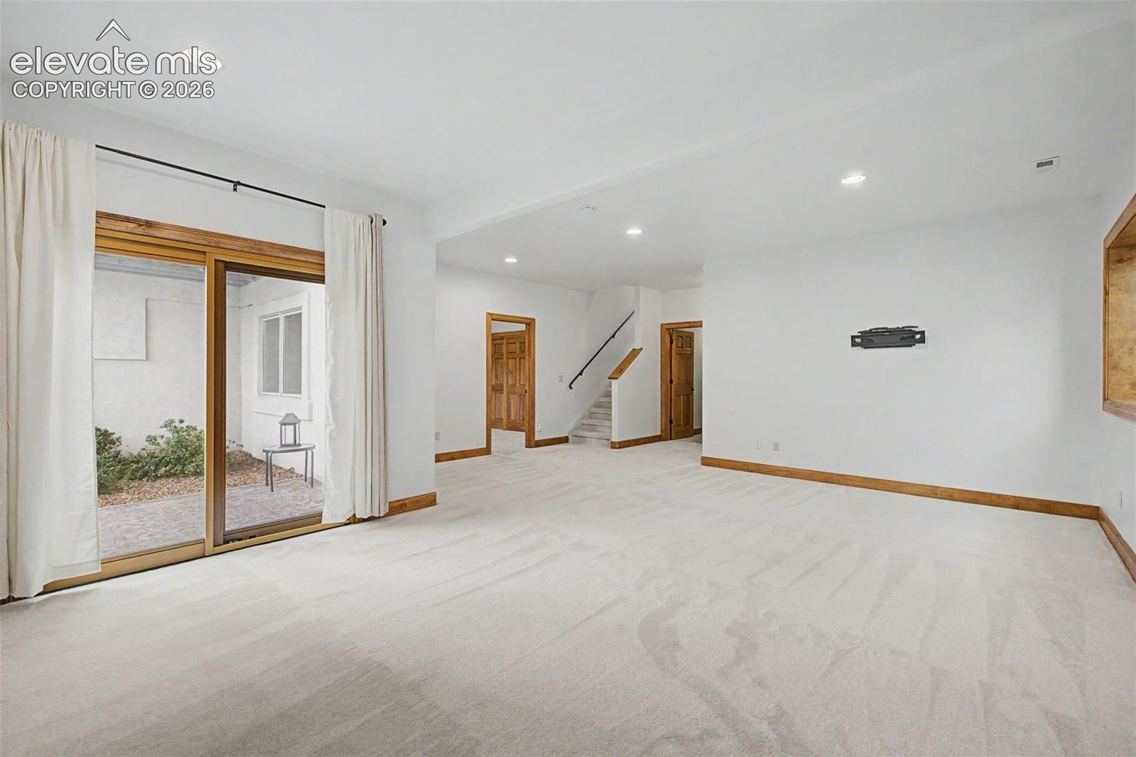 Additional outdoor living space via walk-out.