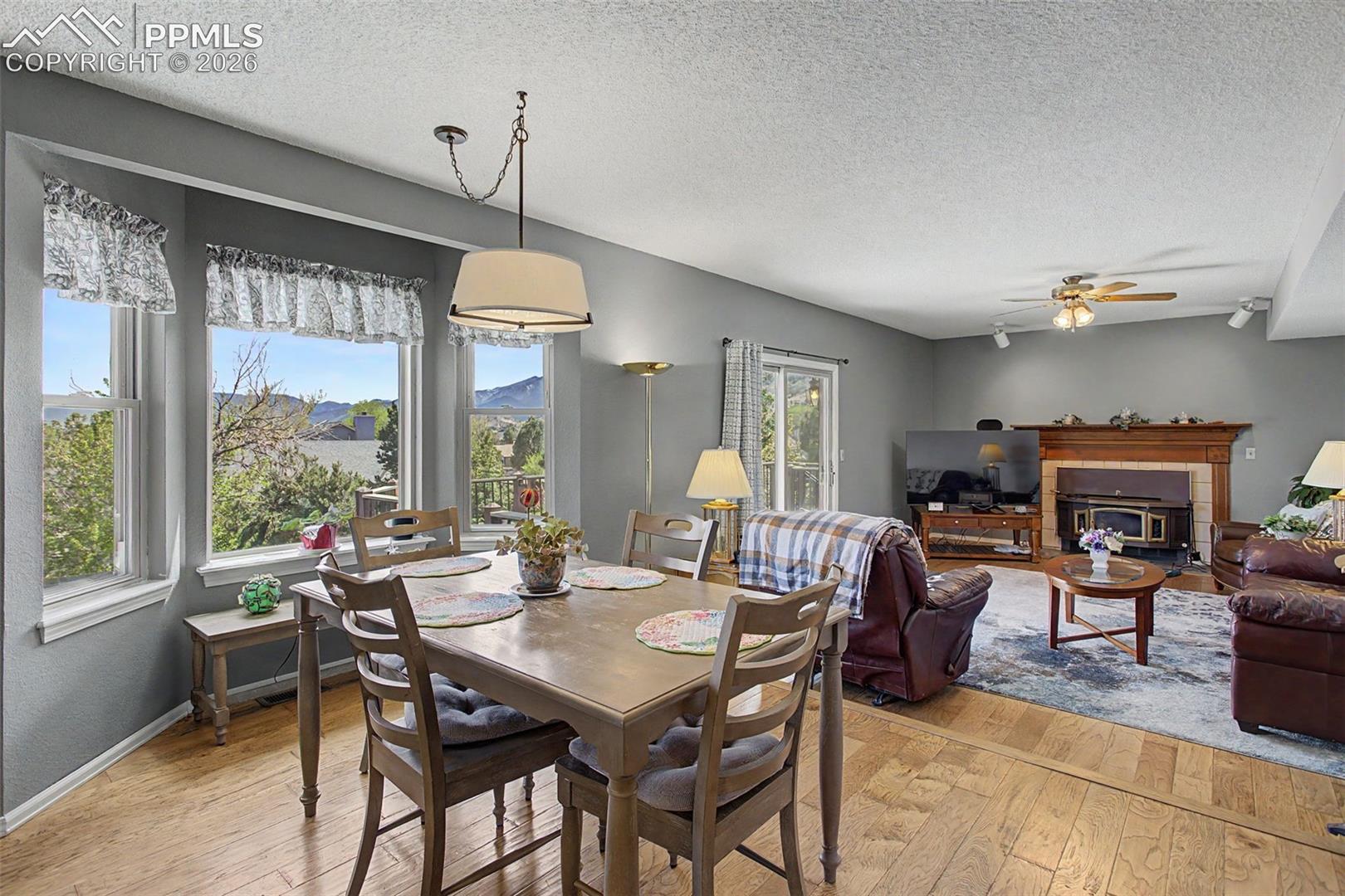 Eat-in breakfast area with charming bay window.