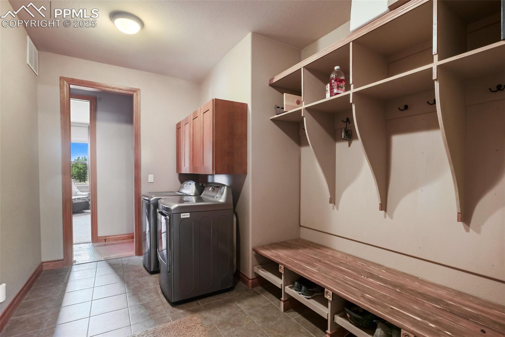 Clothes washing area off the garage 