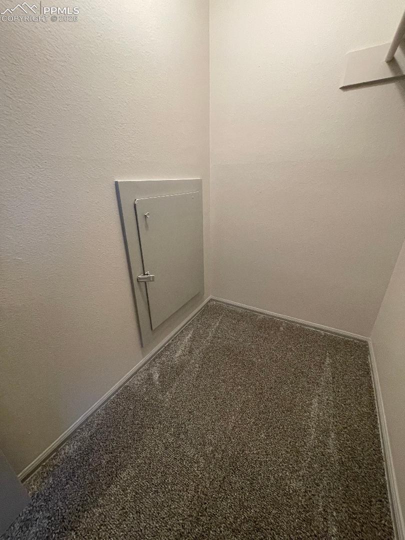 Walk In Closet Downstairs Bedroom #4 (Crawlspace entry) 