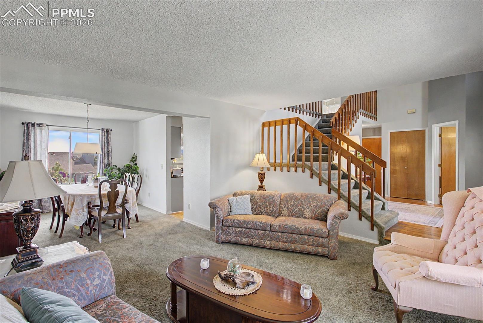 Formal living room, directly to the left upon entry.