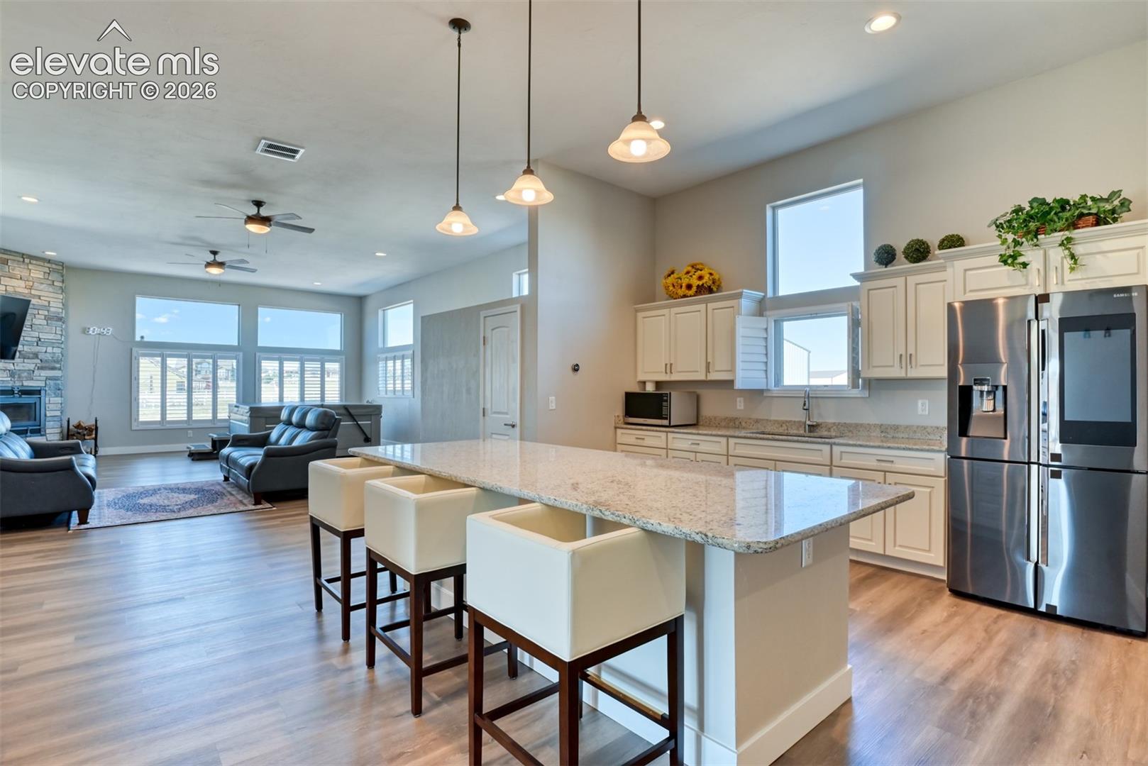 Large family room with kitchenette.
