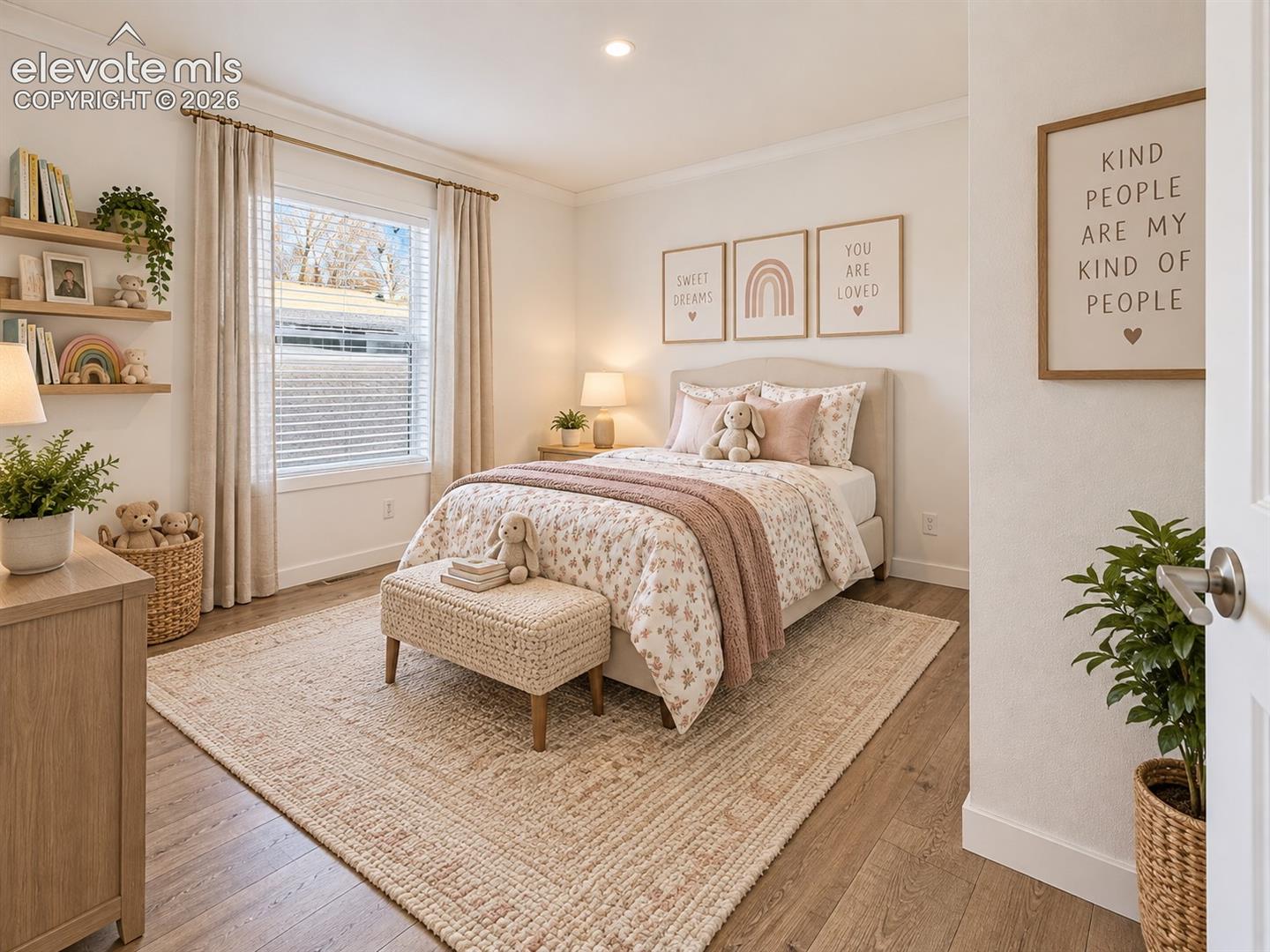 Bedroom – Bright secondary bedroom features a large window, wide-plank flooring, recessed lighting, and a versatile layout with room for additional furnishings.