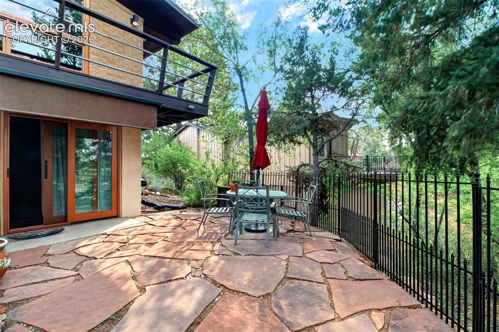 a view of the flagstone patio off of the mother-in-law suite