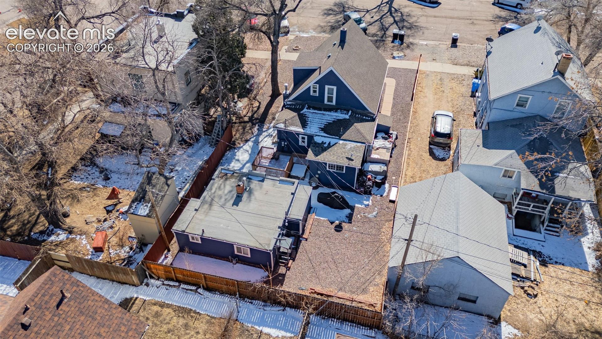 Birds eye view of property with a residential view