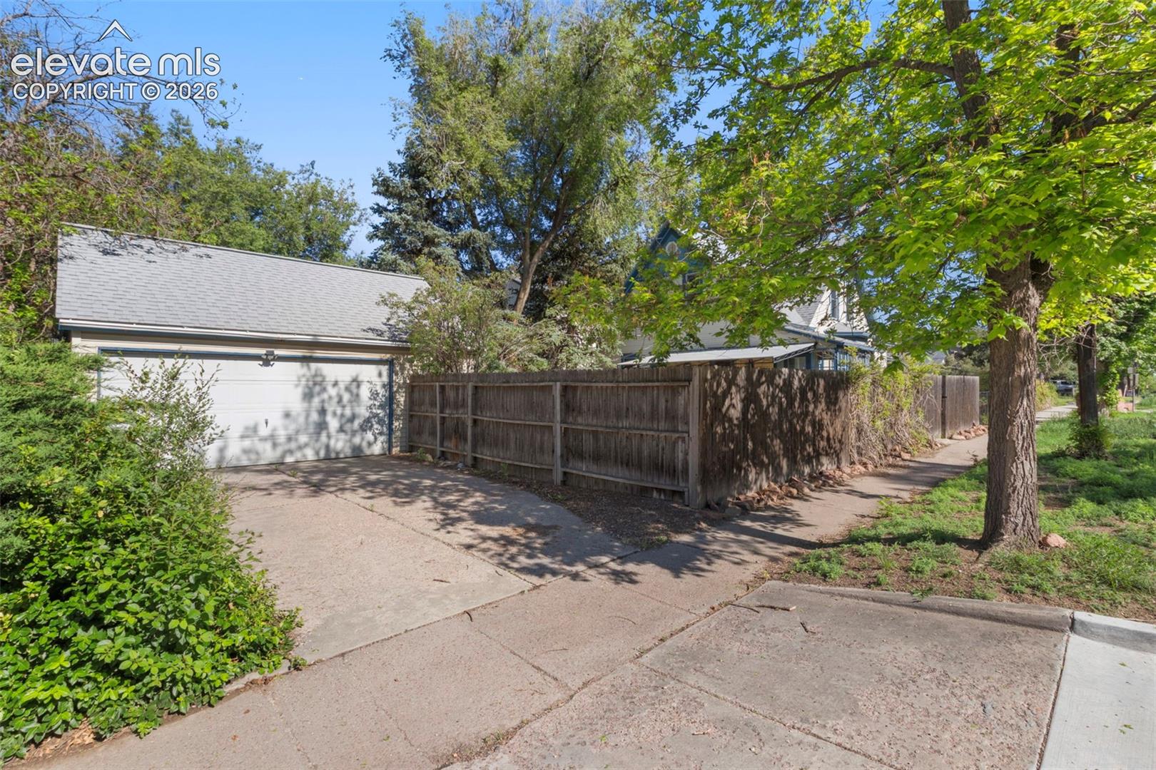 Drive way with over-sized two car garage