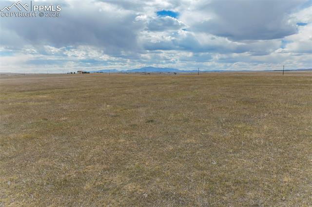 Property view of mountains featuring a rural view