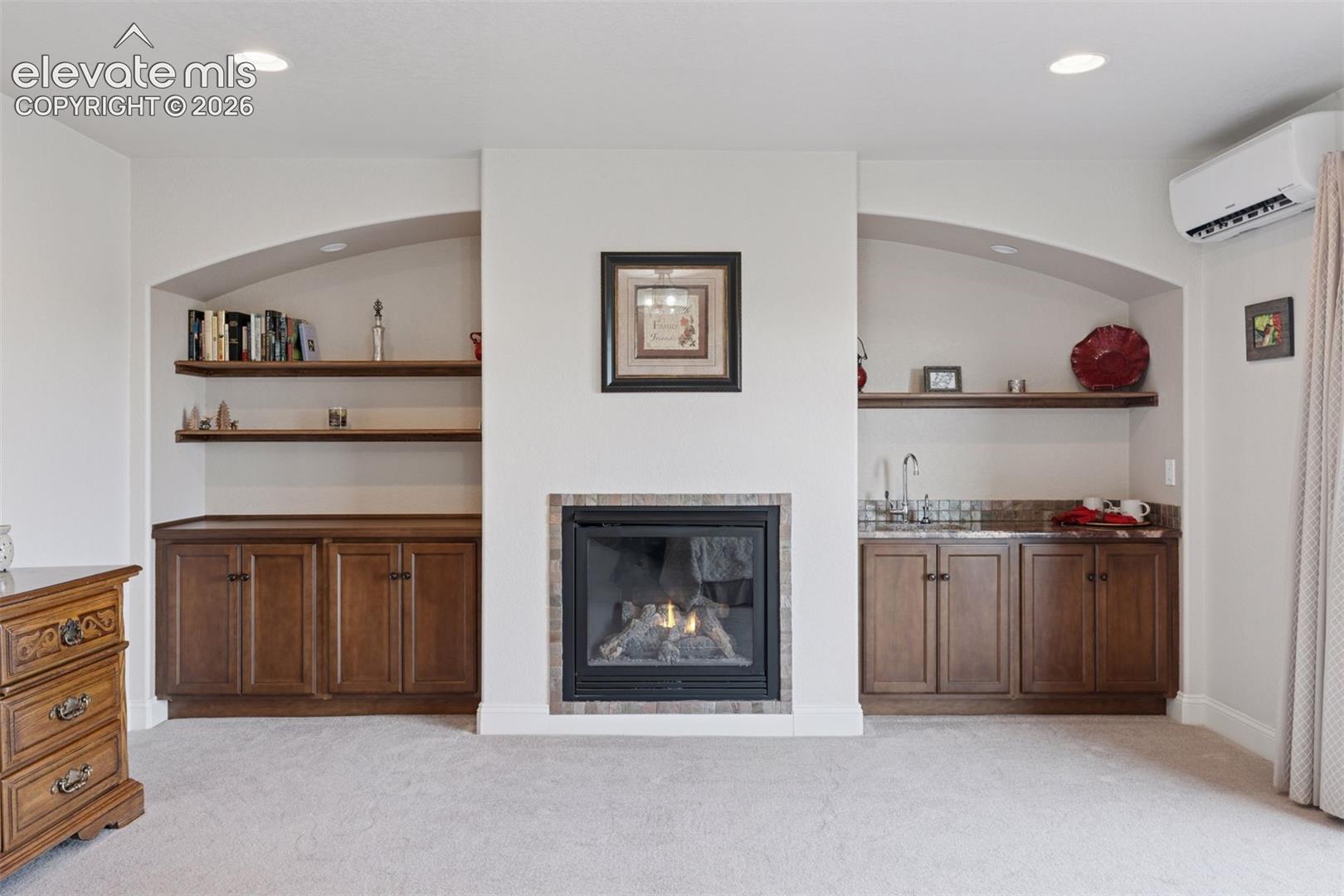 Primary Suite with Fireplace, Built-In Wet/Dry Bar & Insta-Hot Water for morning coffee and teas!