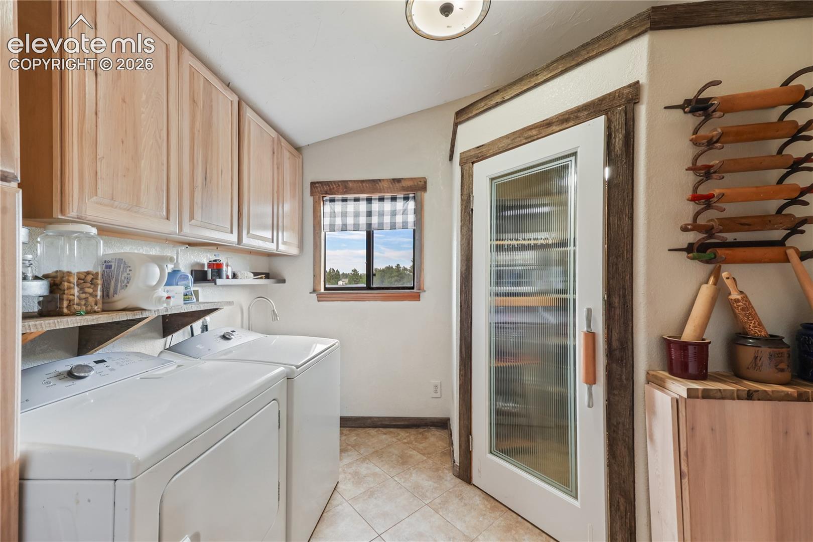 Laundry room with utility sink! Pantry!