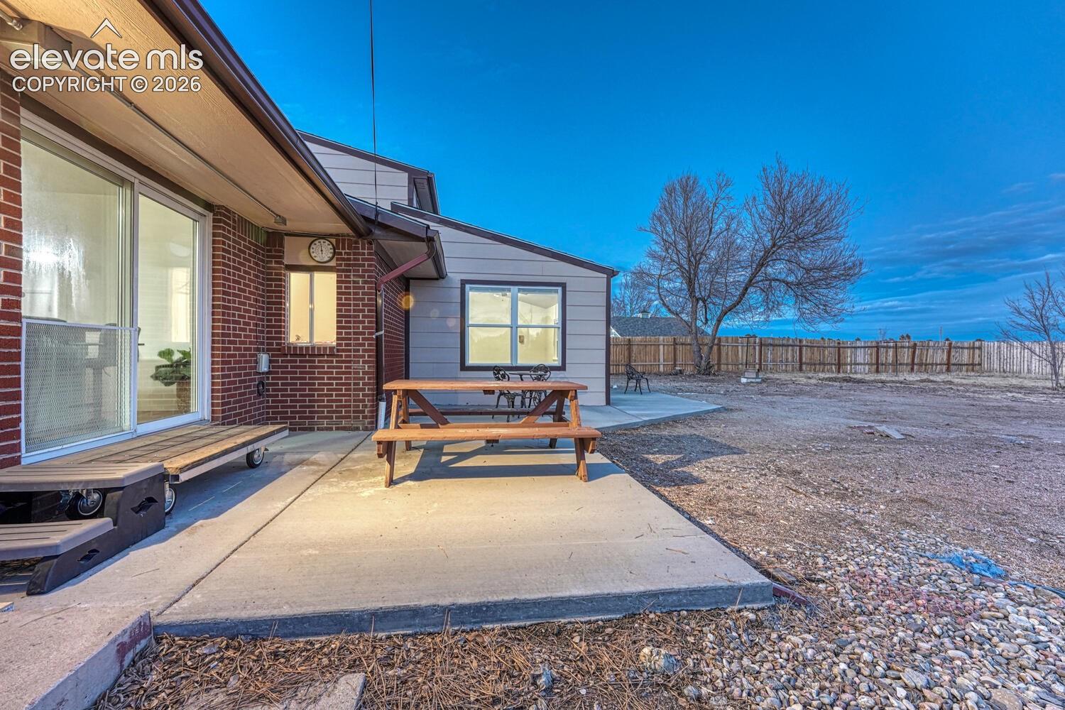 New concrete patio and walkway right off the kitchen.