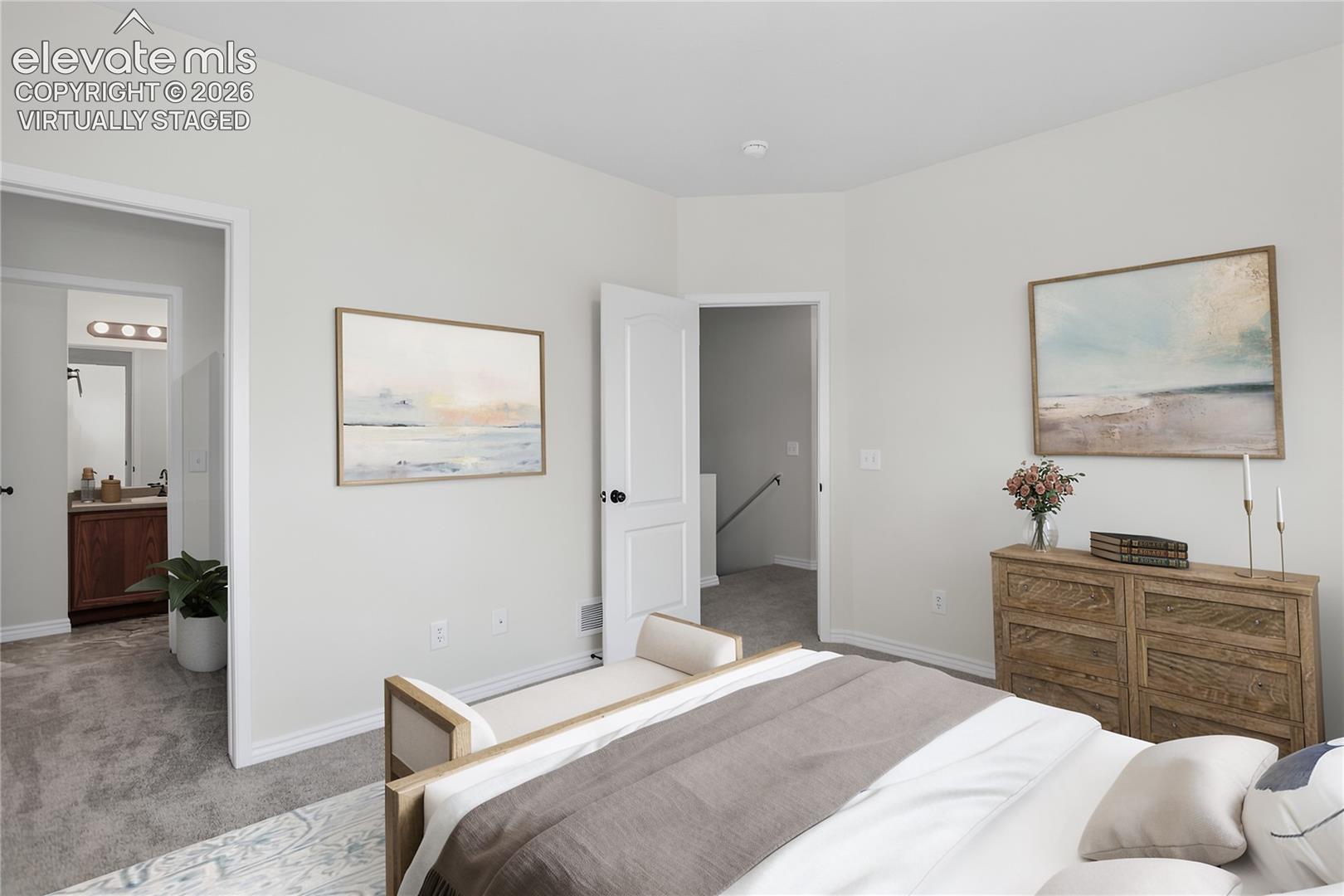 Virtually staged primary bedroom with ensuite bath