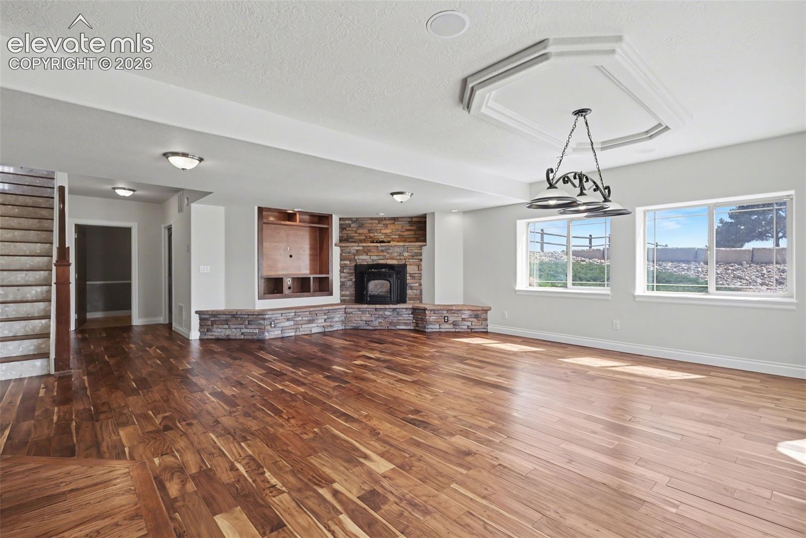 Basement Walk-Out Family Room w/Pellet Stove and Vintage Bar