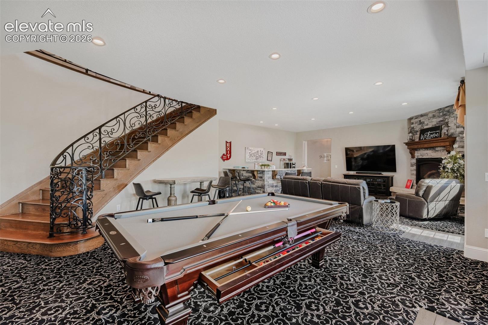 Lower level ELEGANCE. Check out the staircase