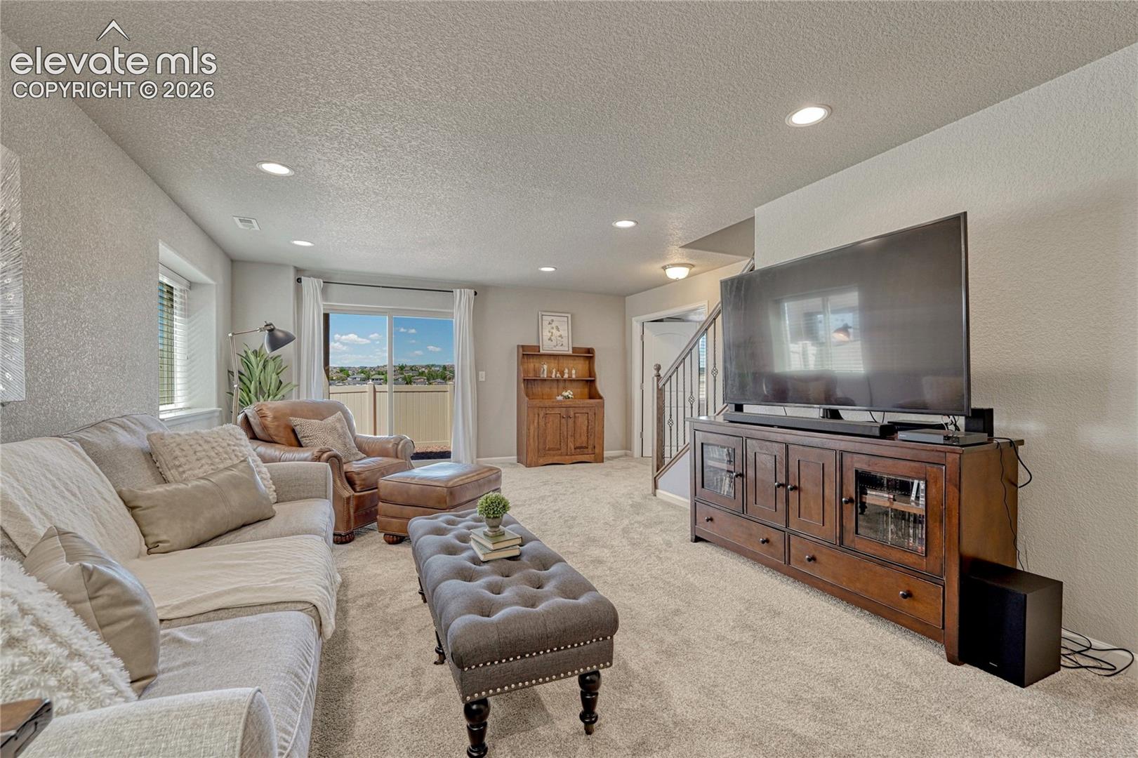 Create your ideal entertainment space in the finished basement, offering room for a media area, game room, or family gathering space with walk-out patio access.