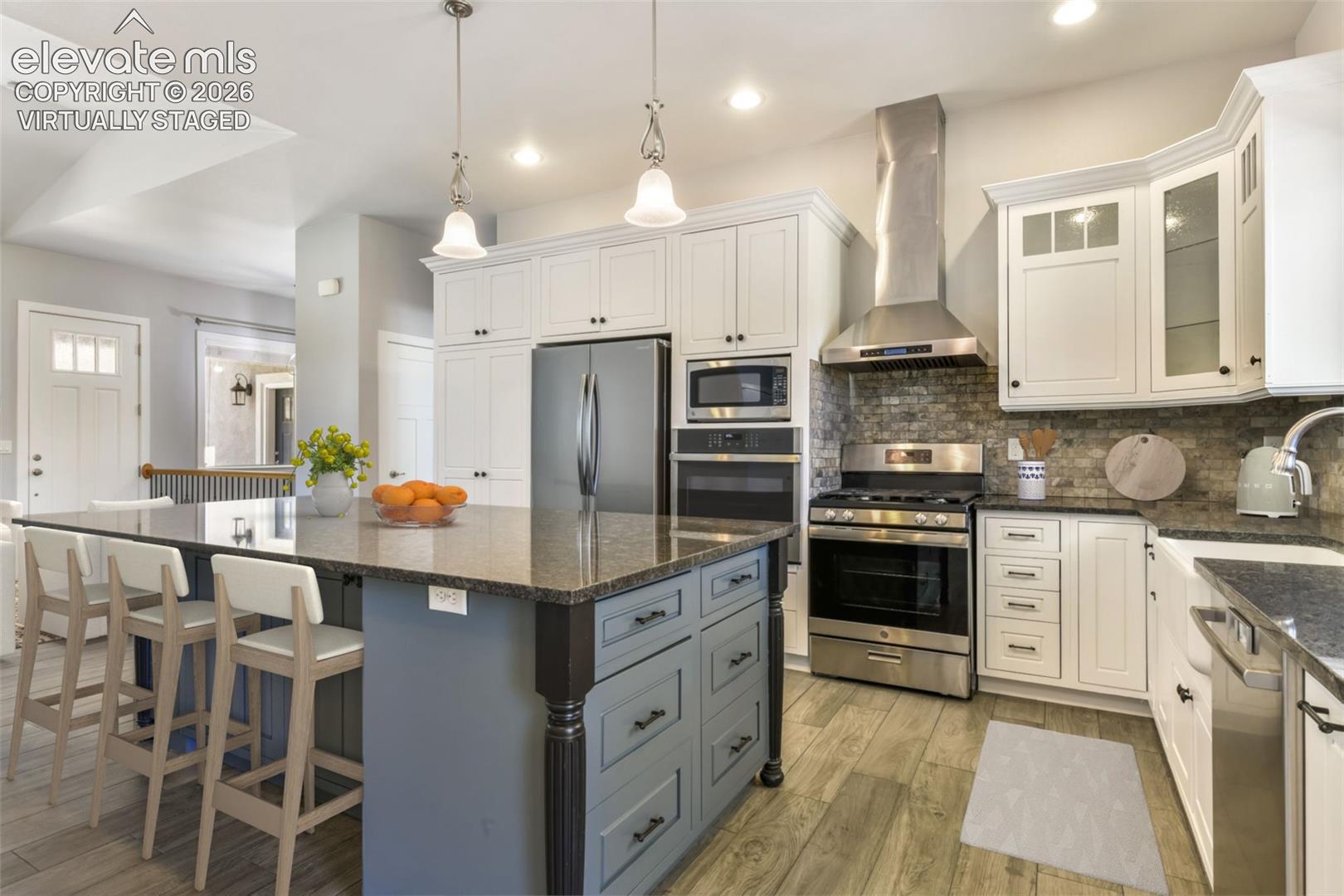 Incredible kitchen with island virtually staged