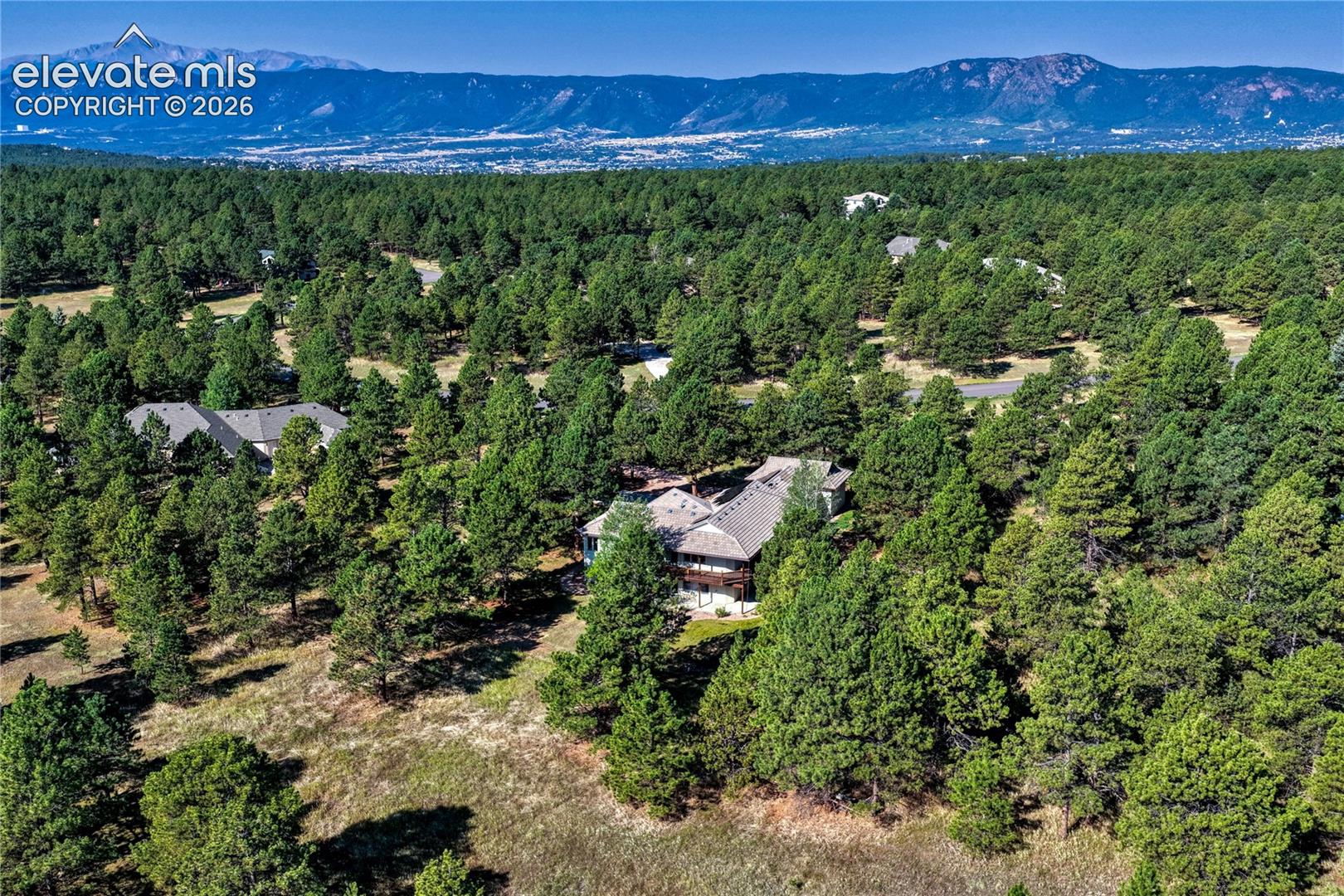 2.5 treed acres with mountain views.
