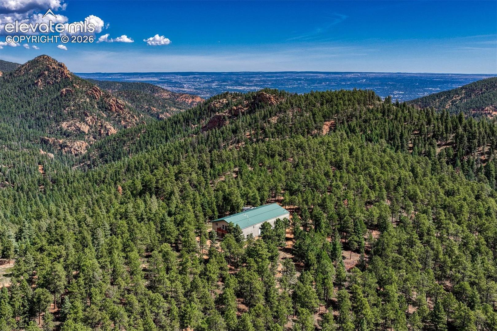 Sitting on top of the world over looking Colorado Springs