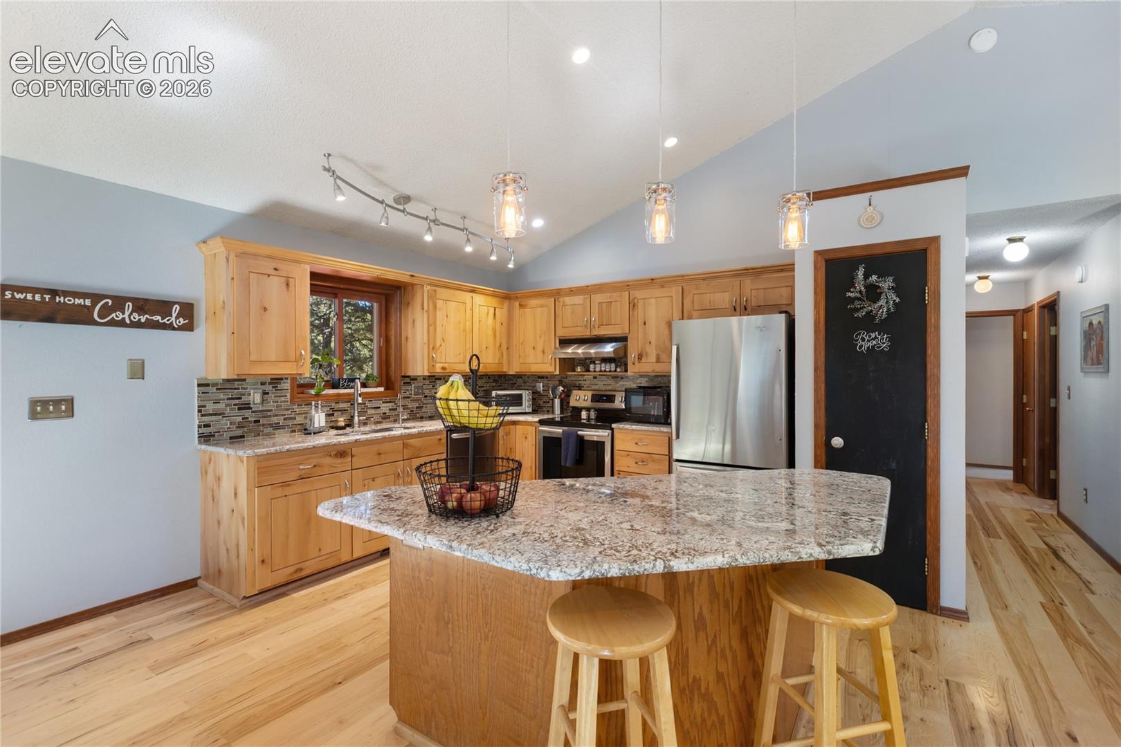 That has been updated with granite counters and stainelss appliances!