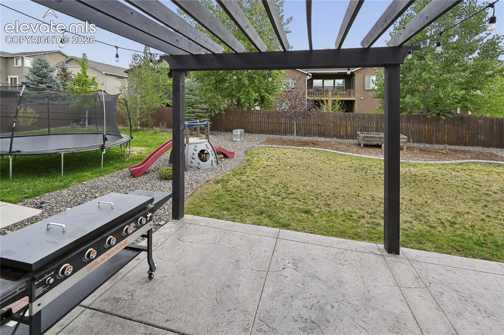 This back yard is great for grilling, chilling, playing, and making friends.  The grass is coming back after a busy summer of outdoor enjoyment.