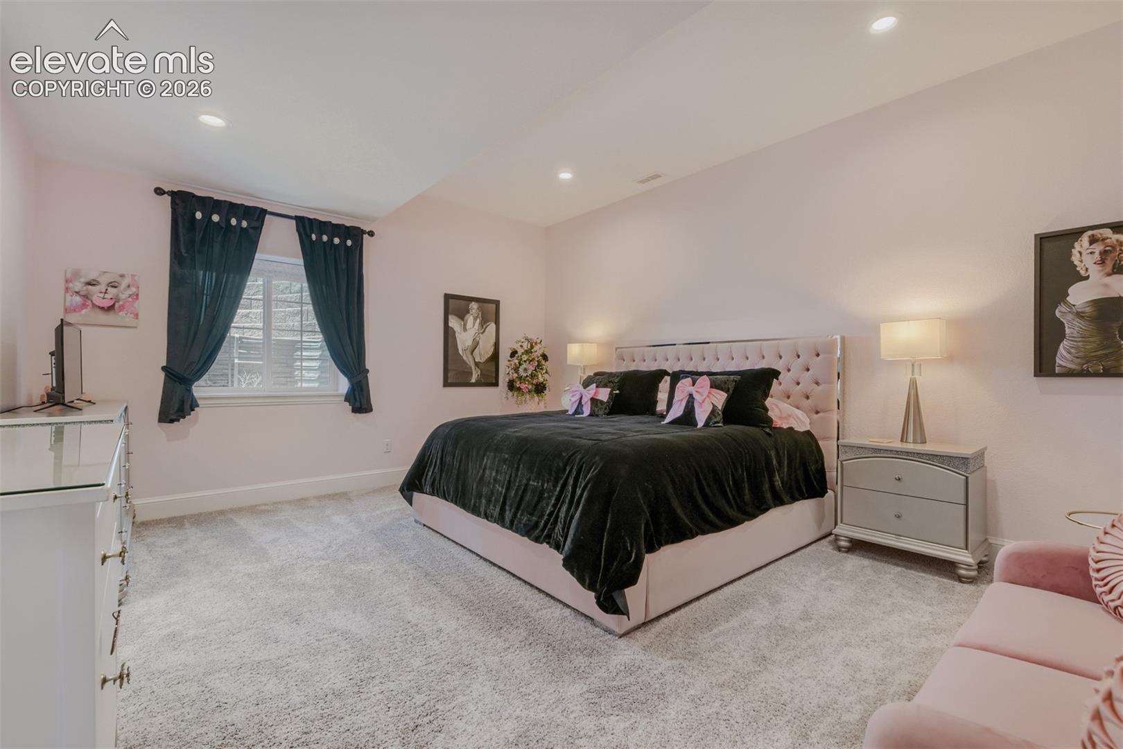 1 of 3 basement bedrooms/each an en suite