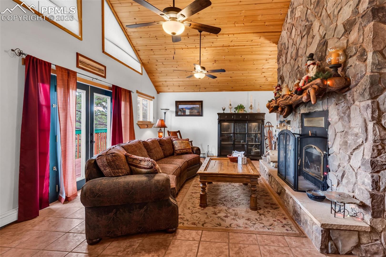 Custom live edge fireplace mantel and wood burning fireplace