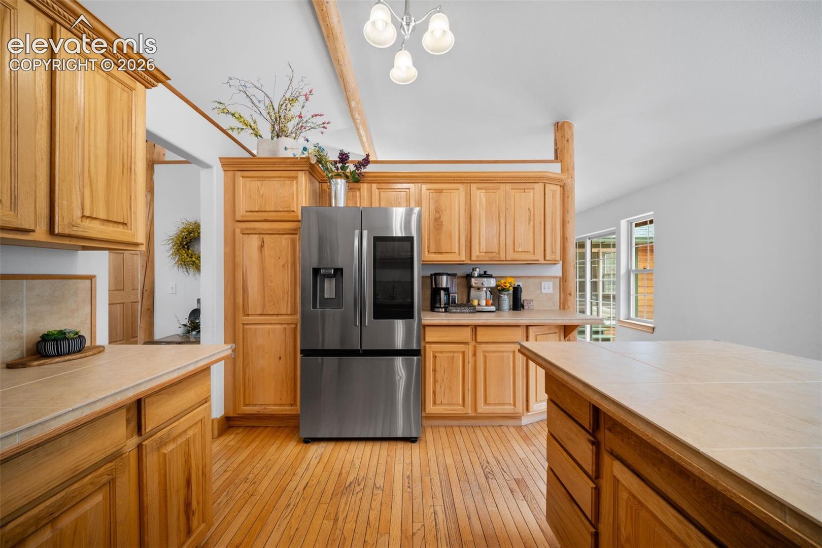 Main level kitchen with pantry and coffee nook