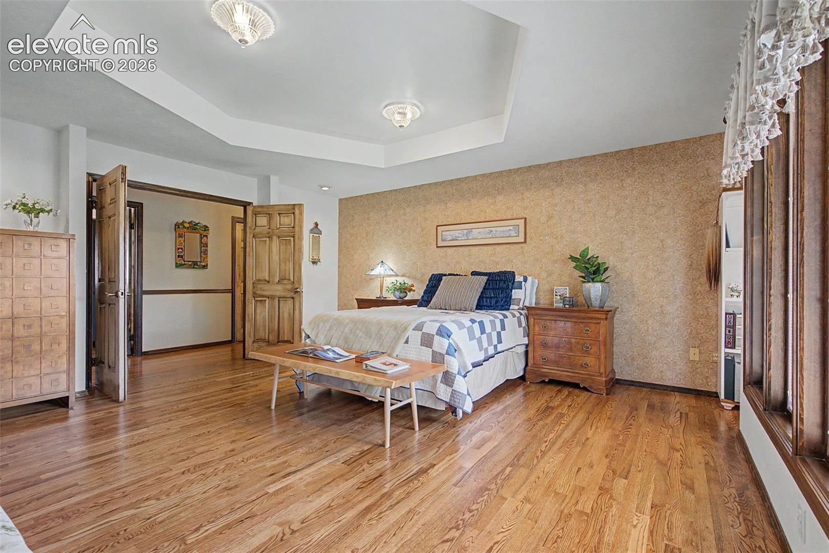 Not just a primary suite, a grand suite with plenty of room for furniture, amazing natural light, and a very large en suite. 