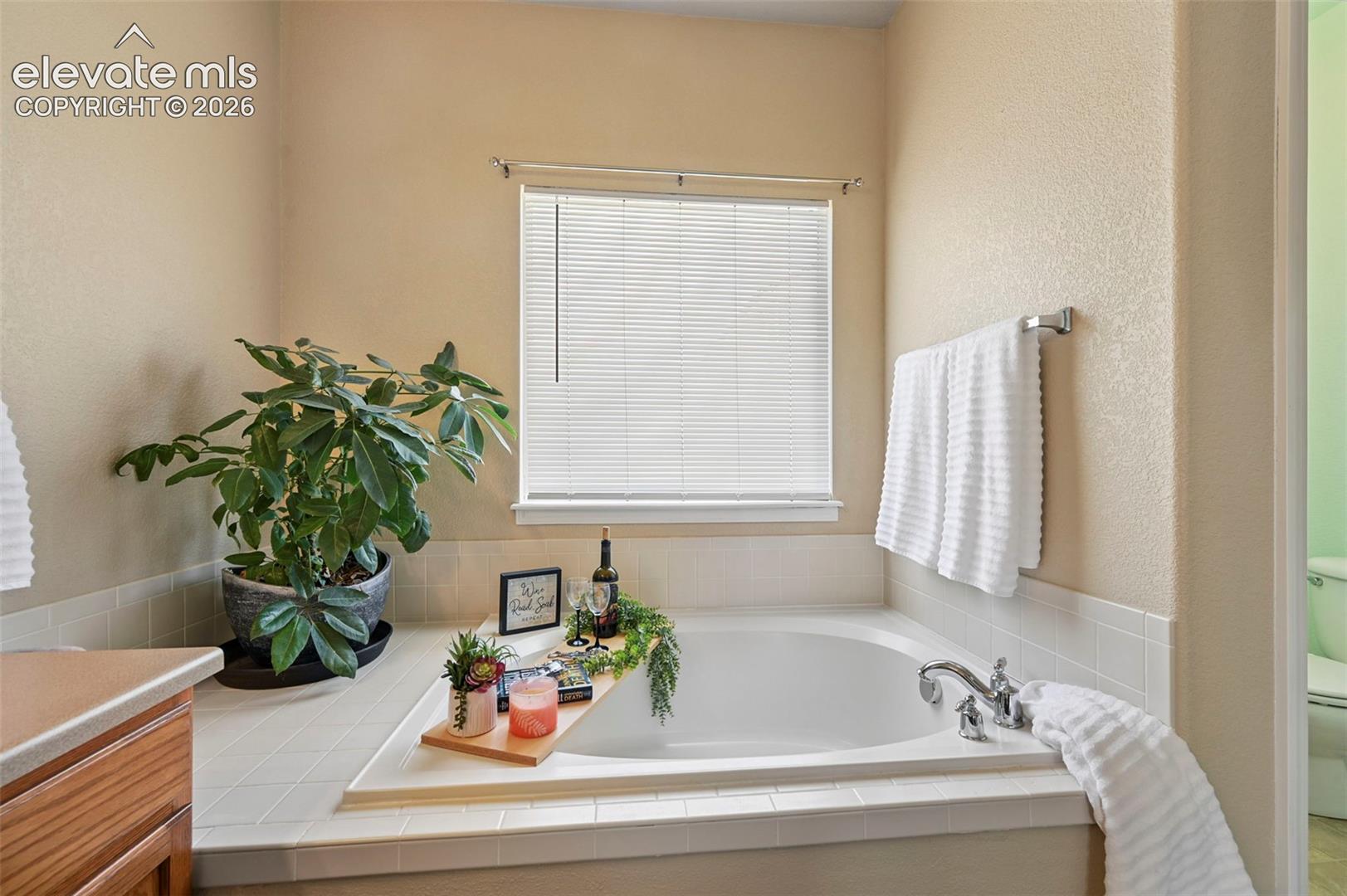 Soaking tub in primary ensuite