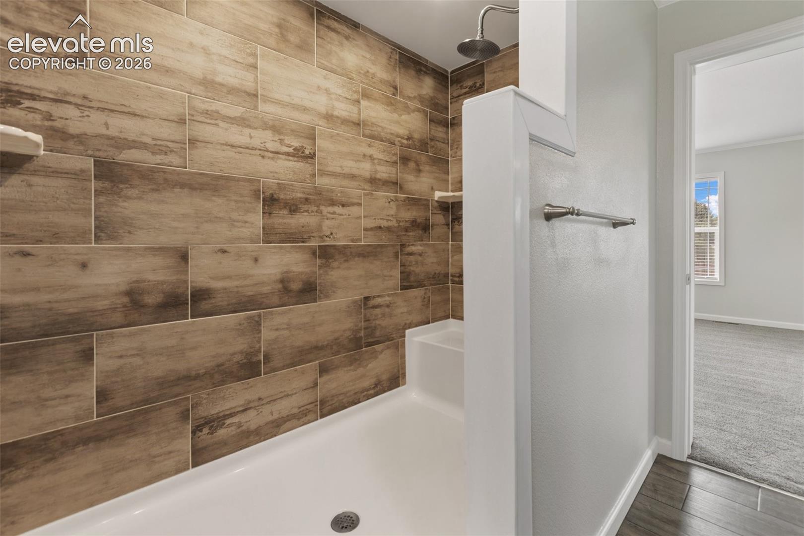 Primary Bathroom oversized shower.