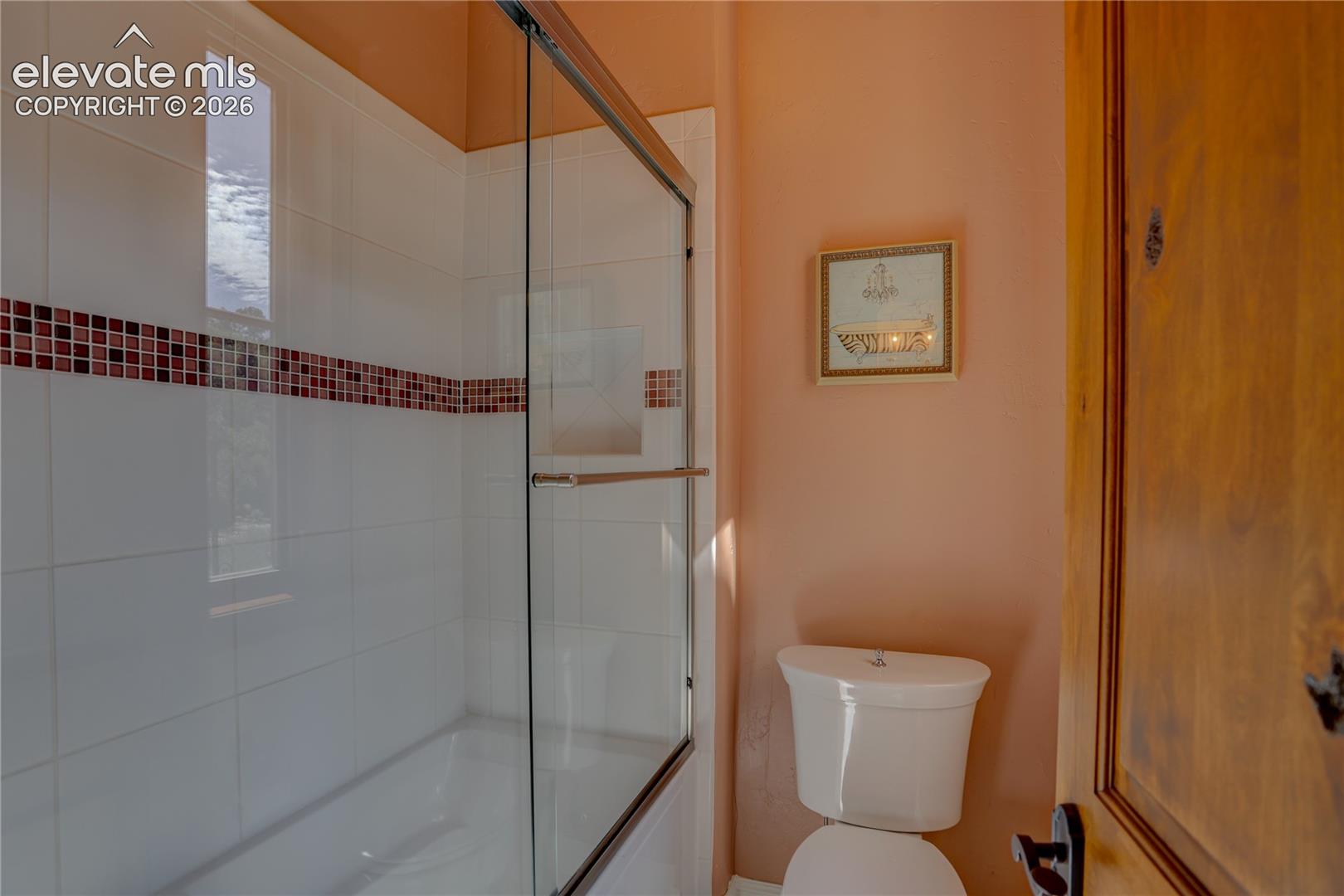 Full bath connecting 2nd and 3rd bedrooms.
