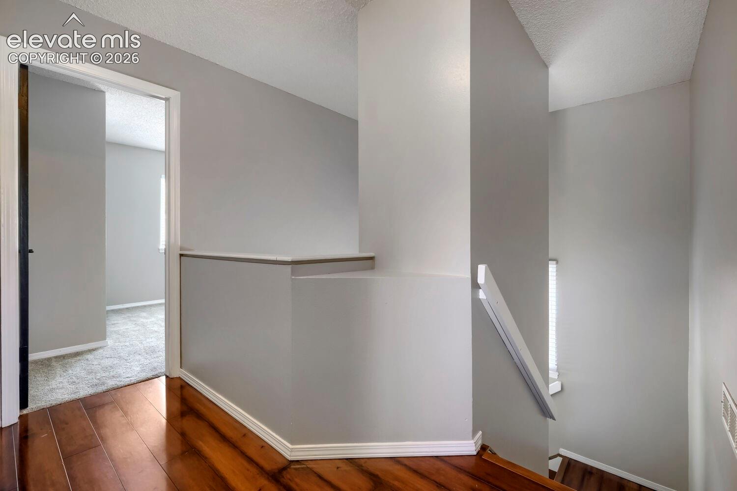 Stairs and landing with view to below.