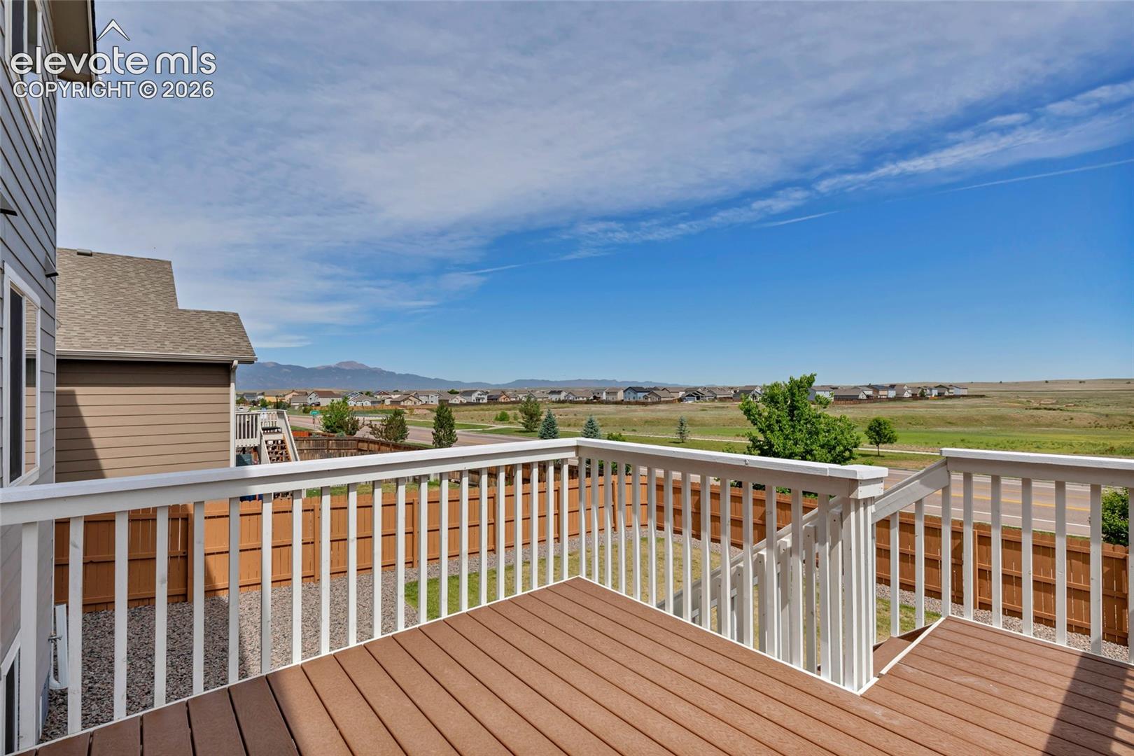 Multi-level composite deck featuring white 