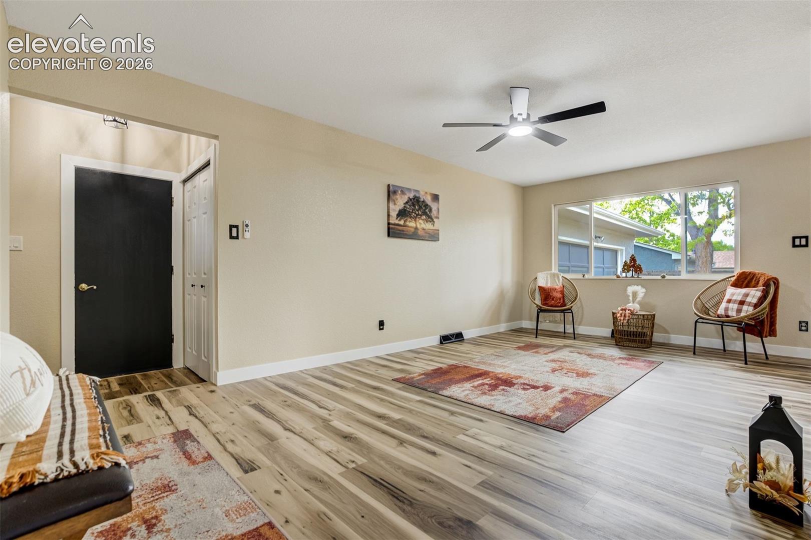 Front entrance, coat closet, and door that leads to the oversized one car garage.
