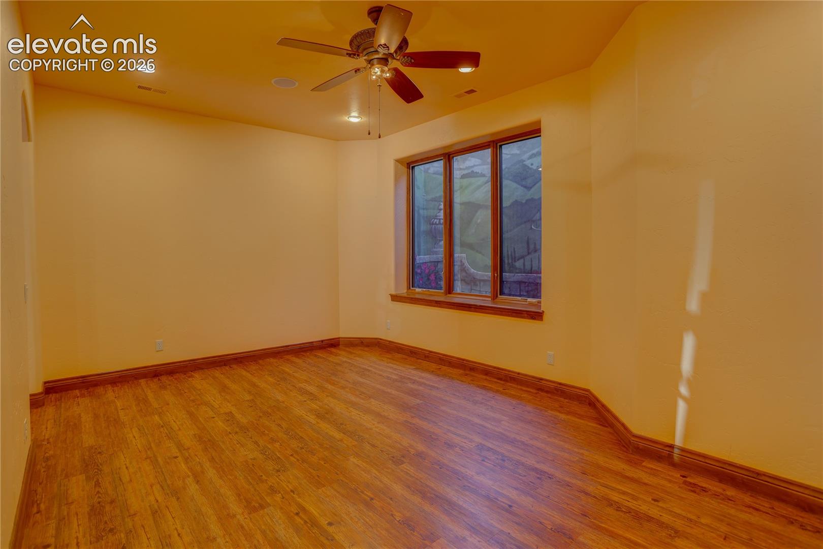 Game room tucked behind wet bar.