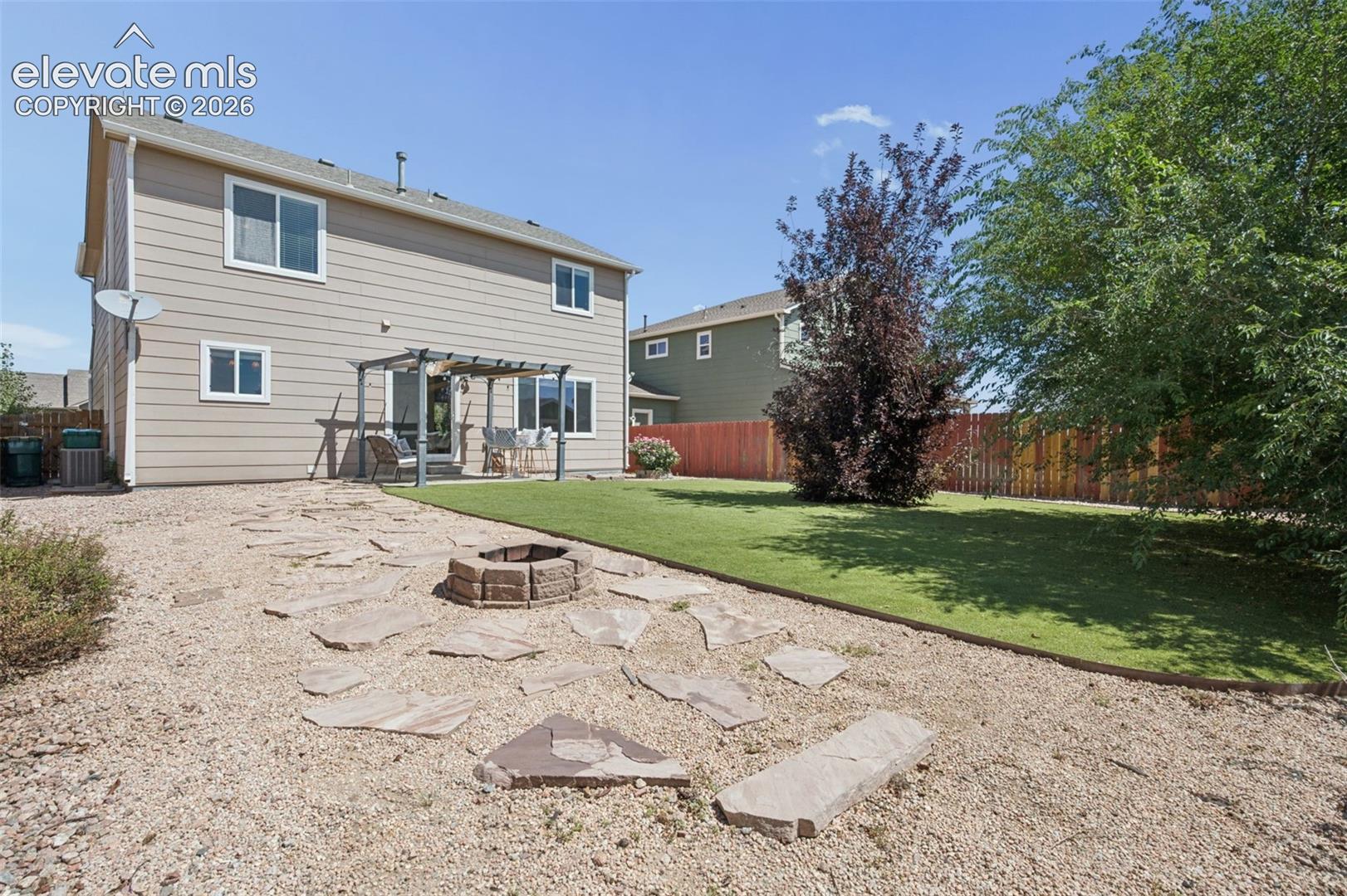 Huge Fenced In Backyard with Fire Pit