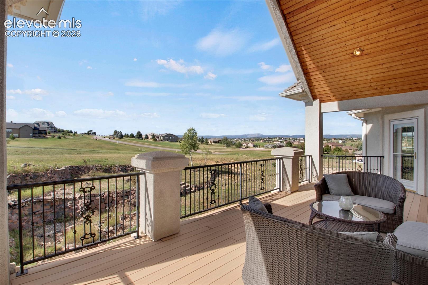 Deck off living, kitchen and primary bedroom