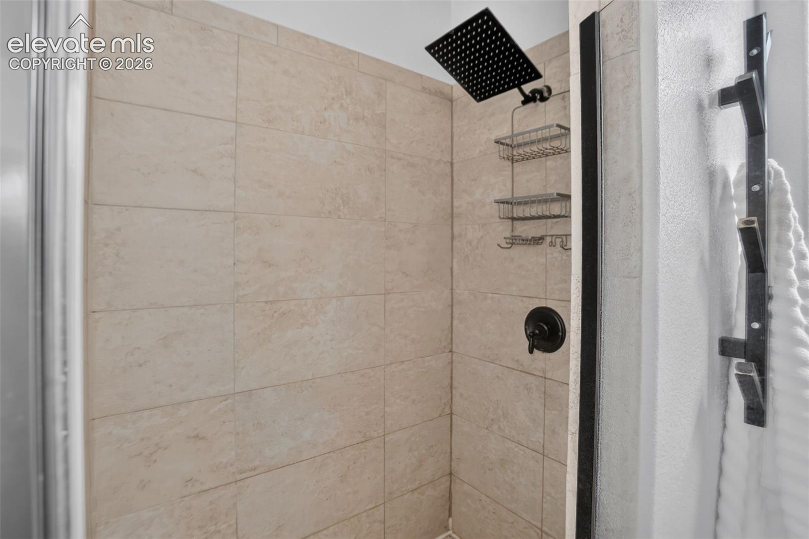 Stand alone shower in primary bathroom.