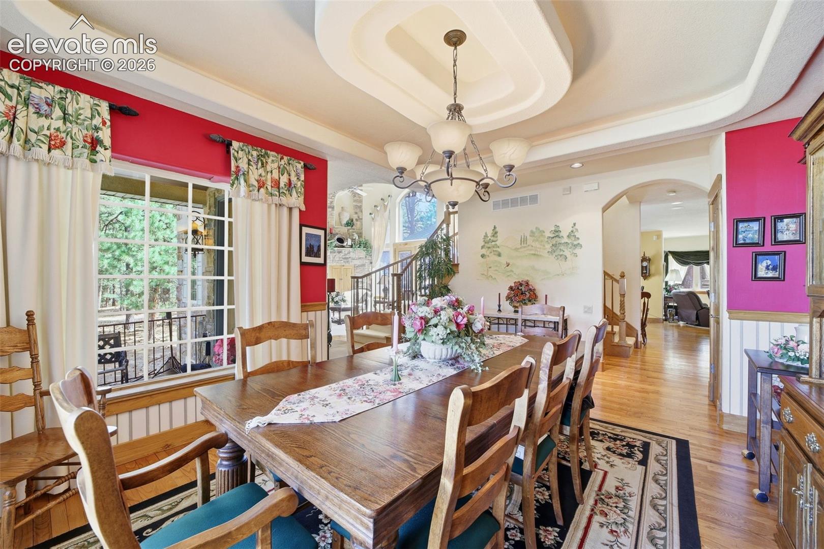 Formal Dining Room with coffered ceilings