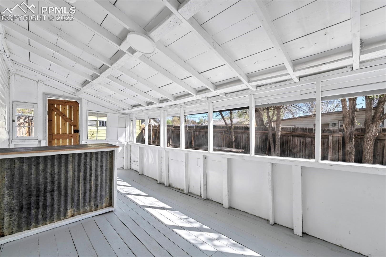 Screened In Porch with exit to backyard