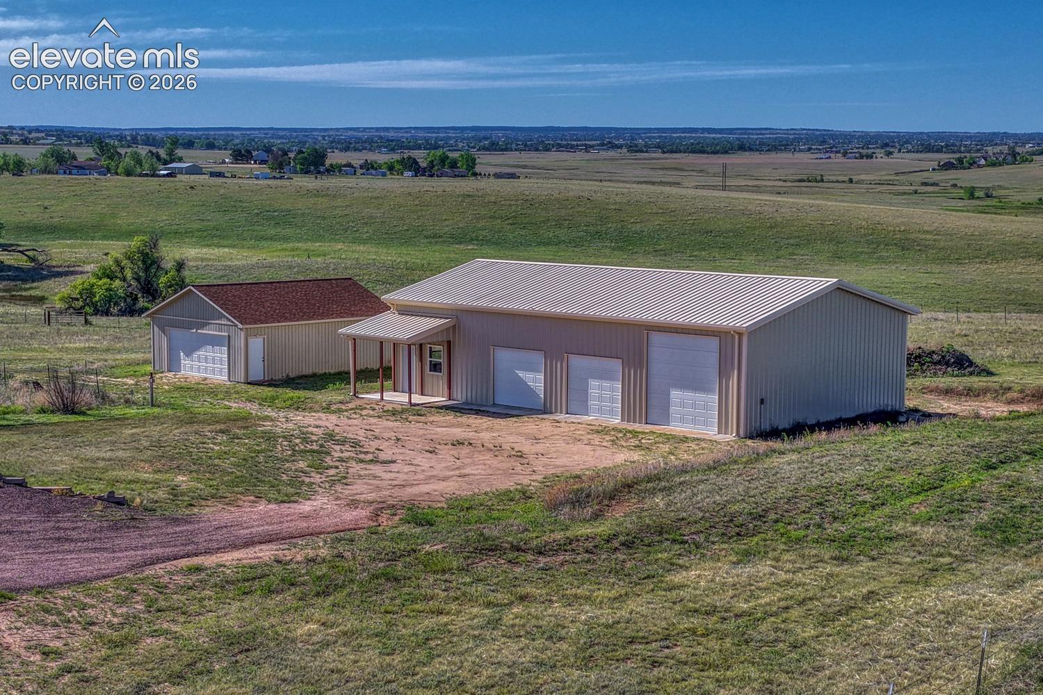 64 x 36sqf NEW shop with elec. polished concrete floor RV parking. Next to 24 x 30 detached garage