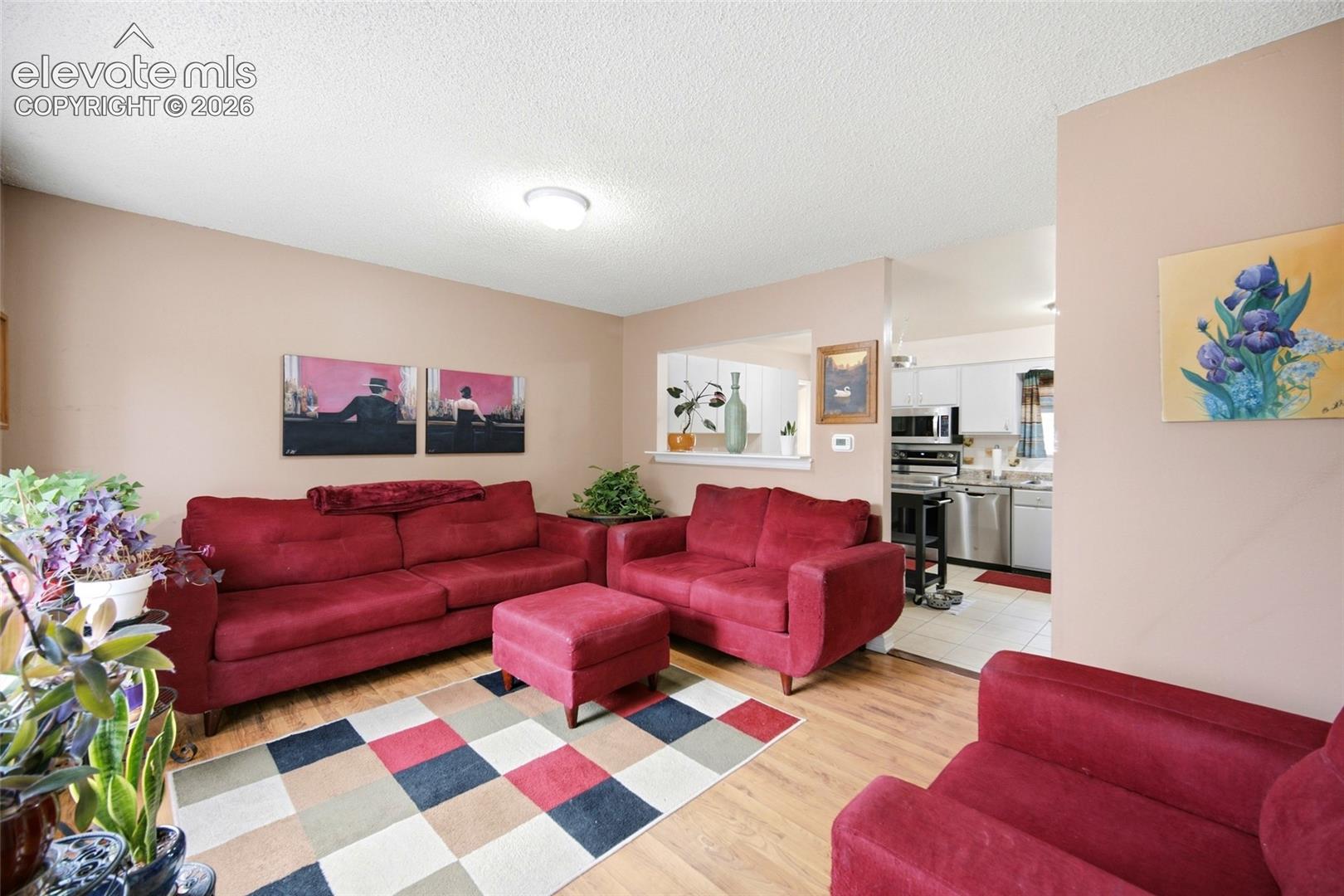 Spacious living room when you walk into the front door. LVP flooring.  