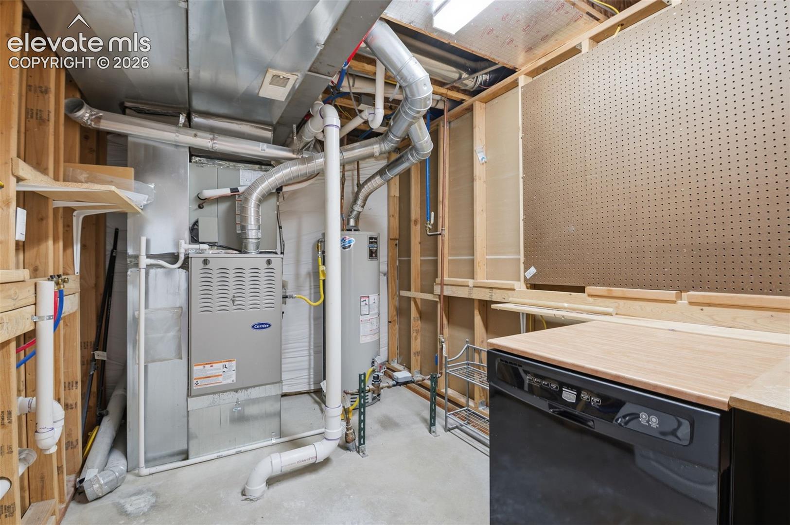 Portable dishwasher in Mechanical closet.