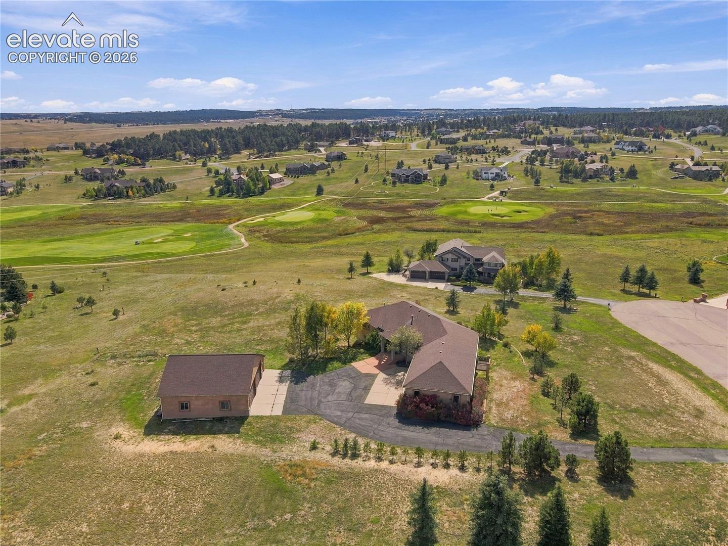Close to golf course with huge large garage surrounded by natural landscaping and ideally located on culdesac