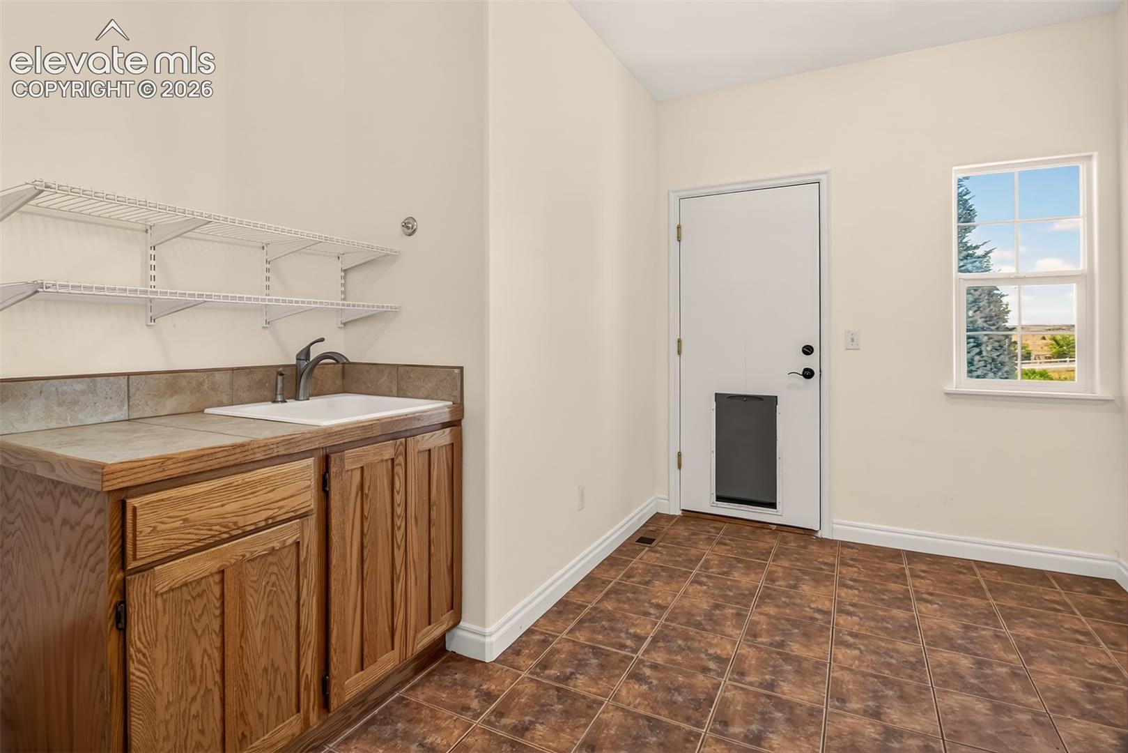 Main Level Laundy Sink/Counter, Door To The Garage Is Pet Friendly