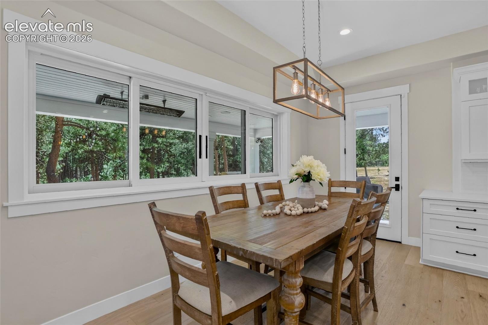 Hand-through window from kitchen to patio