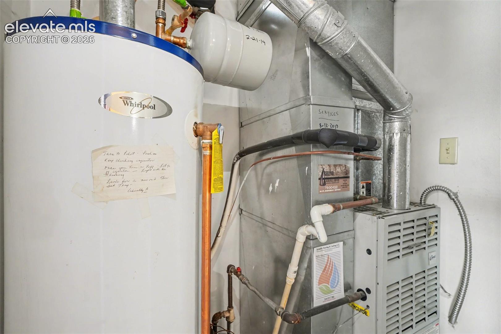 Whirlpool water heater and forced-air furnace unit with metallic ductwork and copper piping