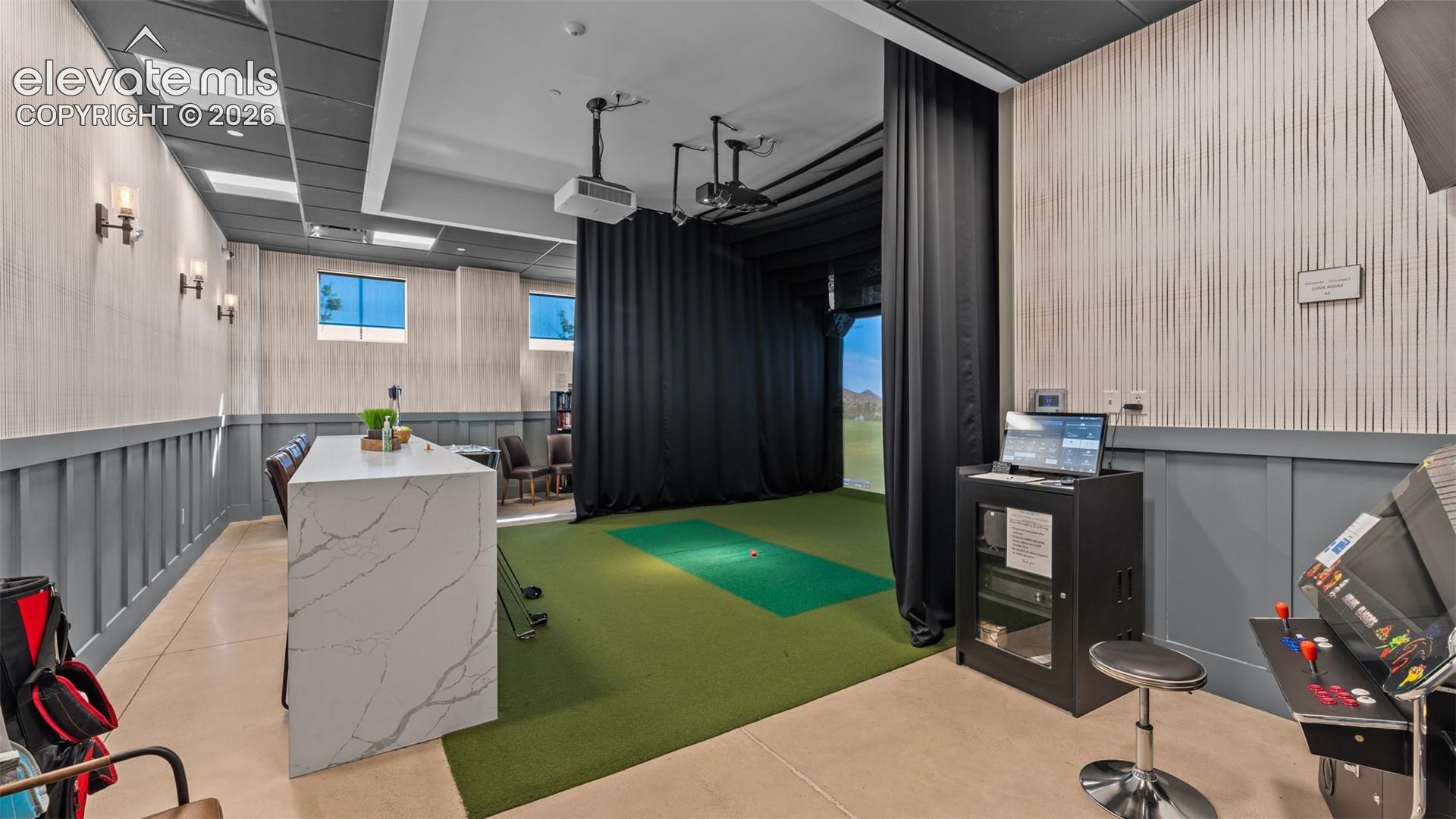 Golf simulator in the community clubhouse.